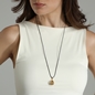 Flowing Aura long cord necklace with perforated gold plated drop motif-