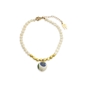 Memory Beat white-gold pearl bracelet and bead-