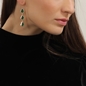 Good Vibes gold plated long earrings with green stones-