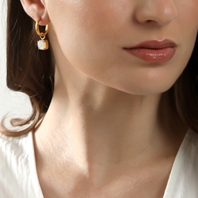 Good Vibes small gold plated hoops with hanging ivory stones-