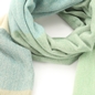 Knitted scarf from viscose green and multicolor stripes-